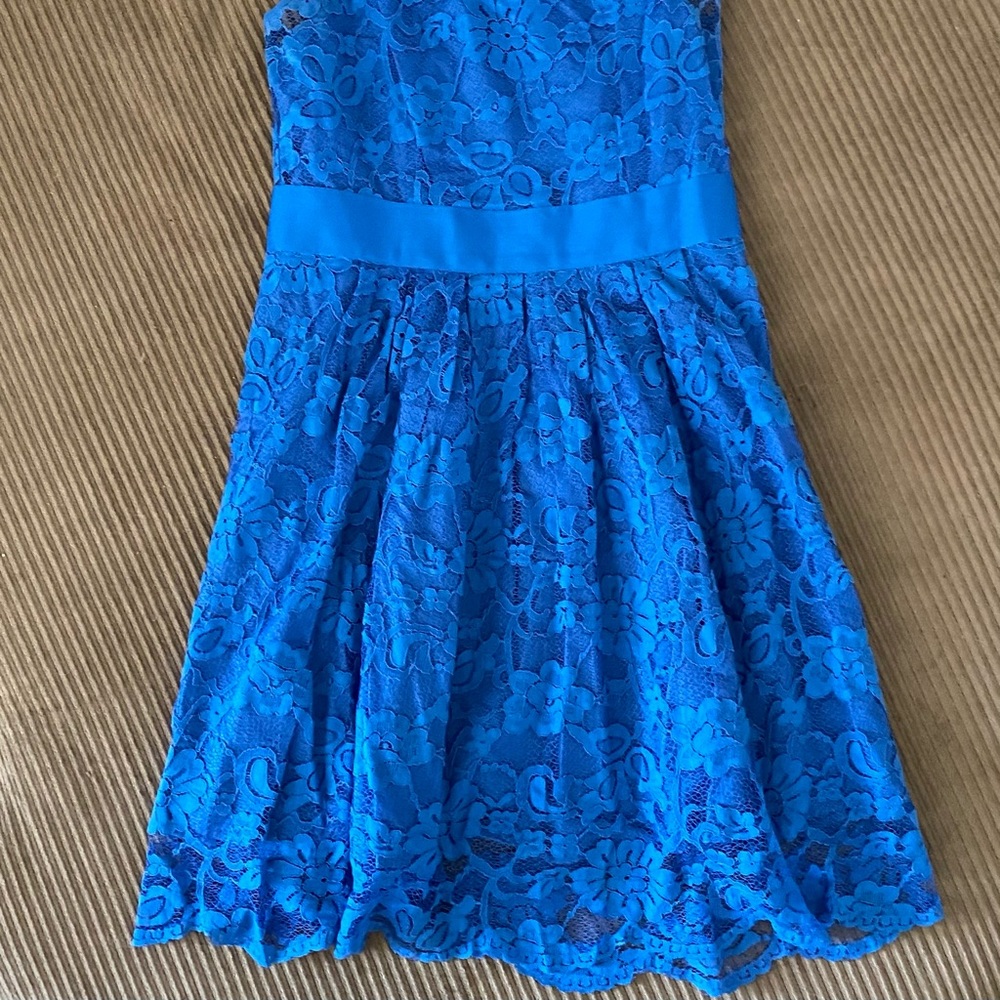 Like new blue lace dress.